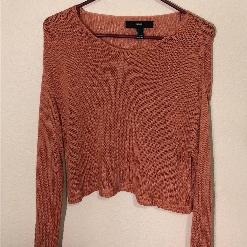 orange cropped sweater.
